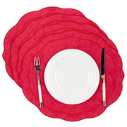 Four red Melbourne scalloped faux leather placemats, stacked, included in the set