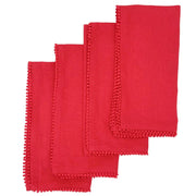 Flat lay of four red Baby's Breath cotton napkins with hand-knotted trim included in the set