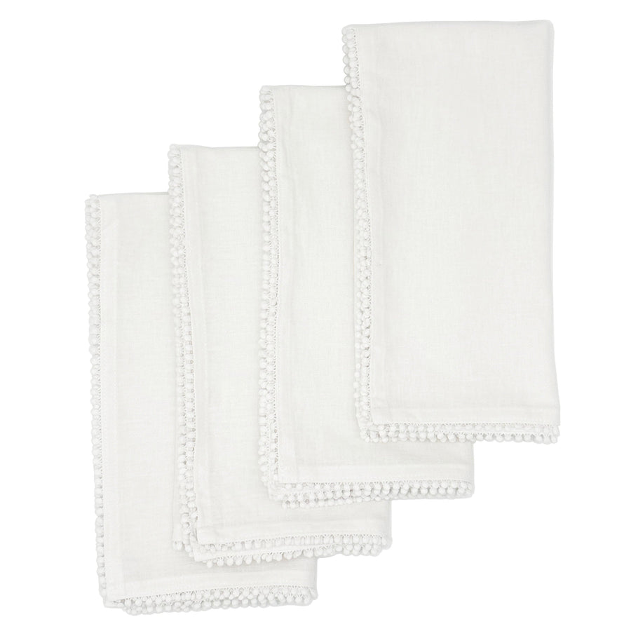 Flat lay of four white Baby's Breath cotton napkins with hand-knotted trim included in the set