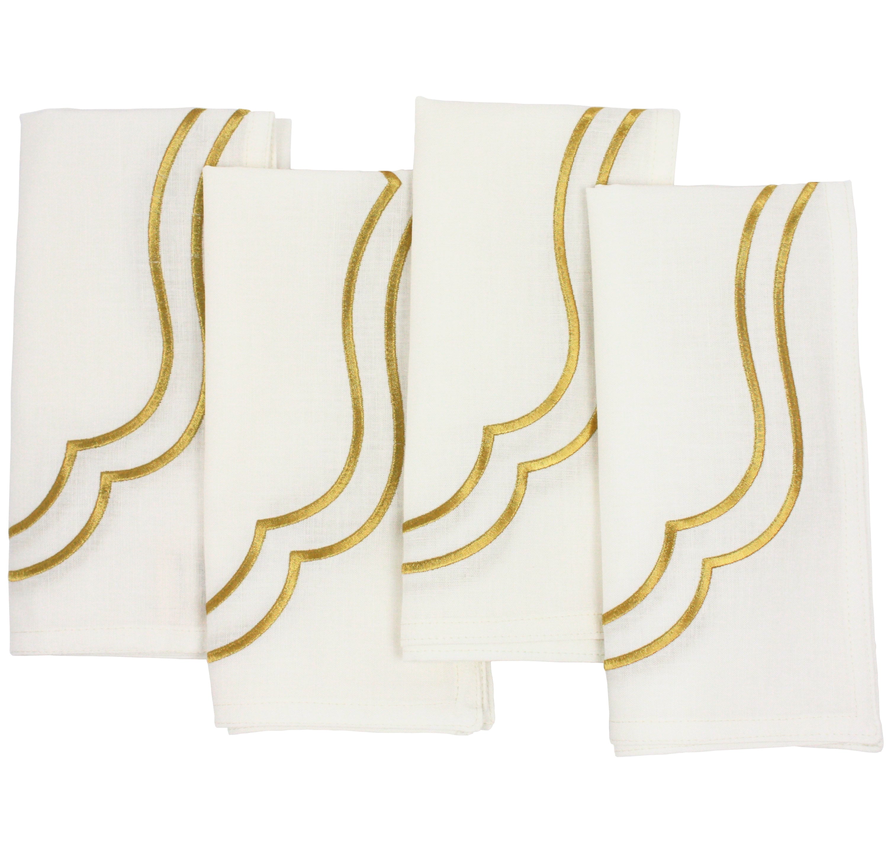 Four ivory Charlotte cotton linen napkins with gold double scallop embroidery, laid flat