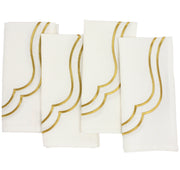 Four ivory Charlotte cotton linen napkins with gold double scallop embroidery, laid flat