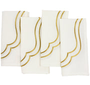 Flat lay of four Ivory Gold Charlotte cotton linen napkins with gold scallop embroidery included in the set